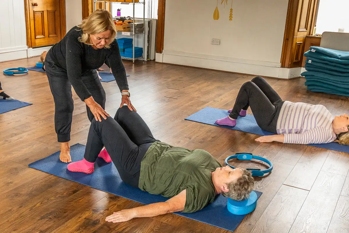 pilates student doing exercise