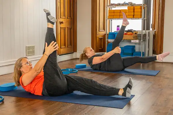 pilates student doing exercise