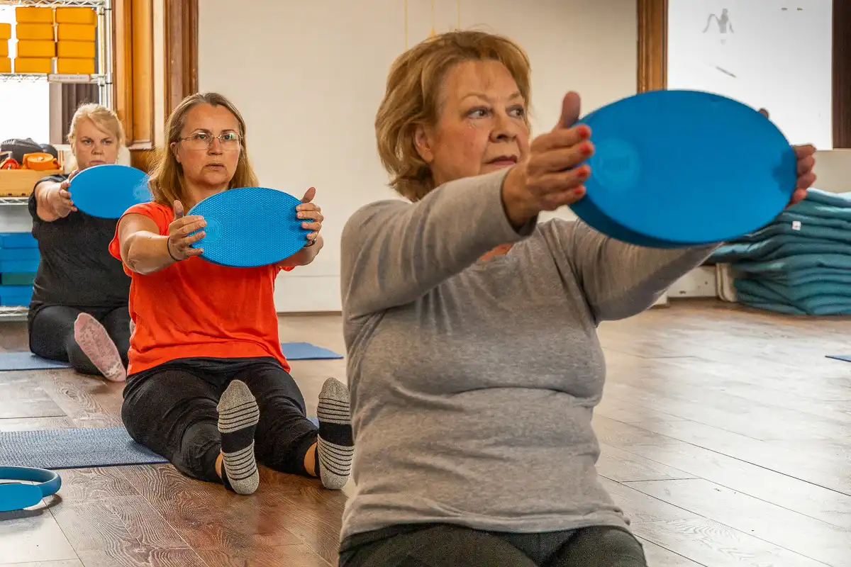 pilates student doing exercise
