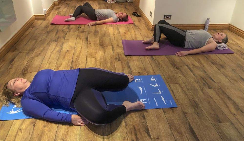 students doing Pilates